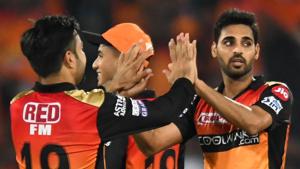 Sunrisers Hyderabad cricketer Bhuvneshwar Kumar (R) celebrates with his teammate Rashid Khan.(AFP) Sunrisers Hyderabad cricketer Bhuvneshwar Kumar (R) celebrates with his teammate Rashid Khan.(AFP)