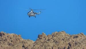 An Indian Air Force chopper flies in the skies of of Leh, Ladakh. Sources said the cameras and surveillance equipment has been removed after the Indian side occupied the dormant height within its territory.(PTI) An Indian Air Force chopper flies in the skies of of Leh, Ladakh. Sources said the cameras and surveillance equipment has been removed after the Indian side occupied the dormant height within its territory.(PTI)