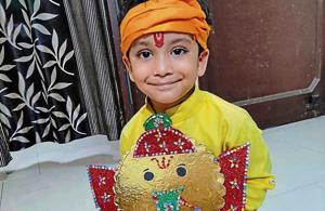 A student of Green Land Convent School, New Subhash Nagar, Ludhiana, taking part in online Anant Chaturdashi celebrations.(HT)