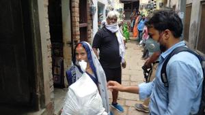 Each kit contained 5 kg flour, 5 kg rice, 2 kg gram, a packet of spice and other eatables. Out of 350, 100 kits were distributed among the families of the boatmen by Upadhyay and his team of social workers. (HT Photo) Each kit contained 5 kg flour, 5 kg rice, 2 kg gram, a packet of spice and other eatables. Out of 350, 100 kits were distributed among the families of the boatmen by Upadhyay and his team of social workers. (HT Photo)
