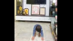 The clip shows a kid rolling up his pants and preparing to do some exercise.(Twitter@BajrangPunia) The clip shows a kid rolling up his pants and preparing to do some exercise.(Twitter@BajrangPunia)