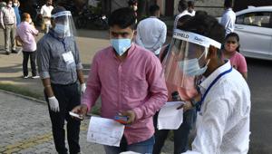 Candidates being shown into an exam centre in Chandigarh on Tuesday.(Ravi Kumar/HT) Candidates being shown into an exam centre in Chandigarh on Tuesday.(Ravi Kumar/HT)