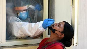 A medical worker collects a swab sample for Covid-19 test New Delhi’s Defence Colony area.(Sonu Mehta/HT PHOTO) A medical worker collects a swab sample for Covid-19 test New Delhi’s Defence Colony area.(Sonu Mehta/HT PHOTO)