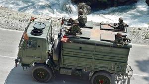Army personnel on the Srinagar-Ladakh highway at Gagangeer in Srinagar on Wednesday. Army personnel on the Srinagar-Ladakh highway at Gagangeer in Srinagar on Wednesday.