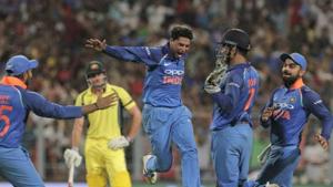 Kuldeep Yadav celebrates with MS Dhoni and Virat Kohli after his hat-trick against Australia(AP) Kuldeep Yadav celebrates with MS Dhoni and Virat Kohli after his hat-trick against Australia(AP)