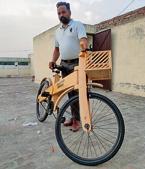 Carpenter Dhani Ram Saggu made the wooden cycle as he could not afford a regular one. He is now receiving orders from South Africa, Canada, Jalandhar and New Delhi.(HT Photo) Carpenter Dhani Ram Saggu made the wooden cycle as he could not afford a regular one. He is now receiving orders from South Africa, Canada, Jalandhar and New Delhi.(HT Photo)