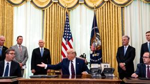 “A truly historic day,” Trump said, with Kosovo Prime Minister Avdullah Hoti and Serbian President Aleksandar Vucic sitting beside him in the Oval Office.(Bloomberg Photo) “A truly historic day,” Trump said, with Kosovo Prime Minister Avdullah Hoti and Serbian President Aleksandar Vucic sitting beside him in the Oval Office.(Bloomberg Photo)
