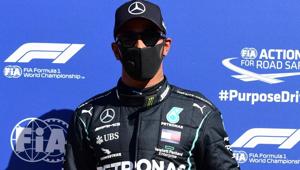 Formula One F1 - Italian Grand Prix - Autodromo Nazionale Monza, Monza, Italy - September 5, 2020 Mercedes' Lewis Hamilton poses with a tyre after qualifying in pole position(REUTERS) Formula One F1 - Italian Grand Prix - Autodromo Nazionale Monza, Monza, Italy - September 5, 2020 Mercedes' Lewis Hamilton poses with a tyre after qualifying in pole position(REUTERS)