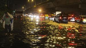 In Delhi, rains led to heavy waterlogging, which disrupted traffic movement on key roads.(PTI photo) In Delhi, rains led to heavy waterlogging, which disrupted traffic movement on key roads.(PTI photo)