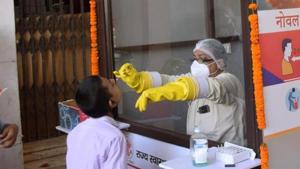 A medic collects a sample for Covid-19 testing during total lockdown at Gardiner Hospital in Patna, Bihar.(Santosh Kumar/ Hindustan Times) A medic collects a sample for Covid-19 testing during total lockdown at Gardiner Hospital in Patna, Bihar.(Santosh Kumar/ Hindustan Times)