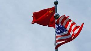 Chinese and US flags flutter near The Bund, before US trade delegation meet their Chinese counterparts for talks in Shanghai, China.(REUTERS) Chinese and US flags flutter near The Bund, before US trade delegation meet their Chinese counterparts for talks in Shanghai, China.(REUTERS)