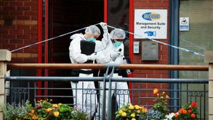 Forensics officers are seen near the scene of reported stabbings in Birmingham, Britain.(REUTERS) Forensics officers are seen near the scene of reported stabbings in Birmingham, Britain.(REUTERS)