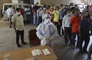 As many as 600 people tested positive in Jammu division, including 56 travellers; while 413 cases were reported from Kashmir, of which 31 were travellers.(AP) As many as 600 people tested positive in Jammu division, including 56 travellers; while 413 cases were reported from Kashmir, of which 31 were travellers.(AP)