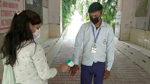 A student ‘s temperature being checked before he enters his classroom at Government High School, Bazidpur, in Sonepat district on Monday. It was one of the two government schools in Haryana that reopened on September 7 for students of Classes 10 and 12 for the first time since March-end when the Covid-19 pandemic broke out in the country.(Manoj Dhaka/HT) A student ‘s temperature being checked before he enters his classroom at Government High School, Bazidpur, in Sonepat district on Monday. It was one of the two government schools in Haryana that reopened on September 7 for students of Classes 10 and 12 for the first time since March-end when the Covid-19 pandemic broke out in the country.(Manoj Dhaka/HT)