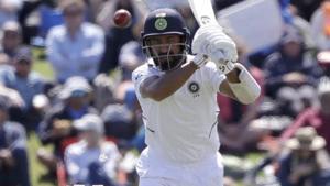 India's Cheteshwar Pujara watches the ball while battling during play on day one of the second cricket test between New Zealand and India at Hagley Oval in Christchurch.(AP) India's Cheteshwar Pujara watches the ball while battling during play on day one of the second cricket test between New Zealand and India at Hagley Oval in Christchurch.(AP)