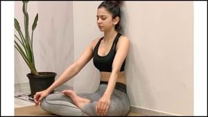 Rakul Preet Singh shows how half lotus can make your morning lit(Instagram/rakulpreet) Rakul Preet Singh shows how half lotus can make your morning lit(Instagram/rakulpreet)