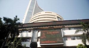 People walk past at a screen displaying India's Finance Minister Nirmala Sitharaman before the budget, on a facade of the Bombay Stock Exchange (BSE) building in Mumbai, February 1, 2020. REUTERS/Francis Mascarenhas/Files(REUTERS) People walk past at a screen displaying India's Finance Minister Nirmala Sitharaman before the budget, on a facade of the Bombay Stock Exchange (BSE) building in Mumbai, February 1, 2020. REUTERS/Francis Mascarenhas/Files(REUTERS)