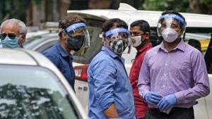 Mumbaikar wearing a face shield and mask as a preventive measure to Covid-19 at Ballard Pier, in Mumbai.(ANI) Mumbaikar wearing a face shield and mask as a preventive measure to Covid-19 at Ballard Pier, in Mumbai.(ANI)