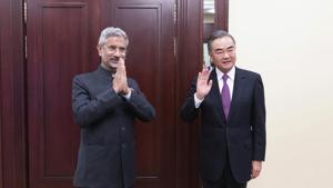 External affairs minister S Jaishankar and Chinese foreign minister Wang Yi pose for a photo as they meet on the sidelines of a meeting of the foreign ministers of the Shanghai Cooperation Organization in Moscow on Thursday.(AP)