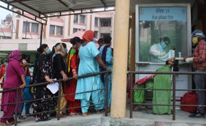 People lined up for giving their samples for Covid-19 testing at the civil hospital in Amritsar. People lined up for giving their samples for Covid-19 testing at the civil hospital in Amritsar.