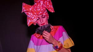 A model holds a face mask prior the fashion show of Spanish designer Agatha Ruiz de la Prada during the Mercedes-Benz Fashion Week in Madrid, Spain, Thursday, Sept. 10, 2020. The Spanish fashion week takes place from 10 to 13 September under new security measures and social distance guidelines due the coronavirus pandemic.(AP) A model holds a face mask prior the fashion show of Spanish designer Agatha Ruiz de la Prada during the Mercedes-Benz Fashion Week in Madrid, Spain, Thursday, Sept. 10, 2020. The Spanish fashion week takes place from 10 to 13 September under new security measures and social distance guidelines due the coronavirus pandemic.(AP)