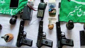 The recoveries included three Chinese pistols, six pistol magazines, 70 pistol rounds, eleven hand grenades.(HT Photo) The recoveries included three Chinese pistols, six pistol magazines, 70 pistol rounds, eleven hand grenades.(HT Photo)
