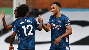 Soccer Football - Premier League - Fulham v Arsenal - Craven Cottage, London, Britain - September 12, 2020 Arsenal's Pierre-Emerick Aubameyang celebrates scoring their third goal with Willian .(Pool via REUTERS) Soccer Football - Premier League - Fulham v Arsenal - Craven Cottage, London, Britain - September 12, 2020 Arsenal's Pierre-Emerick Aubameyang celebrates scoring their third goal with Willian .(Pool via REUTERS)
