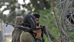 Policeman stand guard during a search operation in Srinagar.(HT File Photo) Policeman stand guard during a search operation in Srinagar.(HT File Photo)