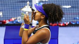 Naomi Osaka of Japan kisses the U.S. Open trophy in celebration after winning her Women’s Singles final match against Victoria Azarenka of Belarus.(Getty Images) Naomi Osaka of Japan kisses the U.S. Open trophy in celebration after winning her Women’s Singles final match against Victoria Azarenka of Belarus.(Getty Images)