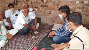 Seen here is the grieving family. Sensing trouble, the police presence was increased in the area. (HT Photo) Seen here is the grieving family. Sensing trouble, the police presence was increased in the area. (HT Photo)