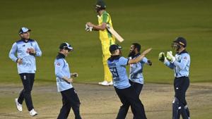 Manchester: England's Adil Rashid, second right, celebrates with teammates after taking the wicket of Australia's Alex Carey to win the second ODI cricket match between England and Australia, at Old Trafford in Manchester, England, Sunday, Sept. 13, 2020. AP/PTI(AP14-09-2020_000068B)(AP) Manchester: England's Adil Rashid, second right, celebrates with teammates after taking the wicket of Australia's Alex Carey to win the second ODI cricket match between England and Australia, at Old Trafford in Manchester, England, Sunday, Sept. 13, 2020. AP/PTI(AP14-09-2020_000068B)(AP)