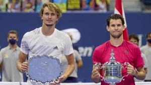 New York: Dominic Thiem, of Austria, right, and Alexander Zverev, of Germany, pose for photos after the men's singles final of the US Open tennis championships, Sunday, Sept. 13, 2020, in New York. Thiem defeated Zverev in a tiebreaker. AP/ PTI Photo(AP14-09-2020_000005A)(AP) New York: Dominic Thiem, of Austria, right, and Alexander Zverev, of Germany, pose for photos after the men's singles final of the US Open tennis championships, Sunday, Sept. 13, 2020, in New York. Thiem defeated Zverev in a tiebreaker. AP/ PTI Photo(AP14-09-2020_000005A)(AP)
