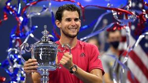 Sep 13 2020; Flushing Meadows, New York, USA; Dominic Thiem of Austria celebrates with the championship trophy after his match against Alexander Zverev of Germany (not pictured) in the men's singles final match on day fourteen of the 2020 U.S. Open tennis tournament at USTA Billie Jean King National Tennis Center. Mandatory Credit: Danielle Parhizkaran-USA TODAY Sports TPX IMAGES OF THE DAY(USA TODAY Sports) Sep 13 2020; Flushing Meadows, New York, USA; Dominic Thiem of Austria celebrates with the championship trophy after his match against Alexander Zverev of Germany (not pictured) in the men's singles final match on day fourteen of the 2020 U.S. Open tennis tournament at USTA Billie Jean King National Tennis Center. Mandatory Credit: Danielle Parhizkaran-USA TODAY Sports TPX IMAGES OF THE DAY(USA TODAY Sports)