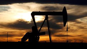 The sun sets behind a crude oil pump jack on a drill pad in the Permian Basin in Loving County, Texas, US.(Reuters File Photo) The sun sets behind a crude oil pump jack on a drill pad in the Permian Basin in Loving County, Texas, US.(Reuters File Photo)