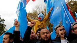 A masked Uighur boy takes part in a protest against China, at the courtyard of Fatih Mosque in Istanbul, Turkey in 2018.(Reuters file) A masked Uighur boy takes part in a protest against China, at the courtyard of Fatih Mosque in Istanbul, Turkey in 2018.(Reuters file)