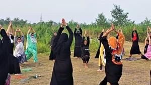 Women, many of them in burqa, practicing yoga in Haldwani town of Nainital district in Uttarakhand.(HT Photo) Women, many of them in burqa, practicing yoga in Haldwani town of Nainital district in Uttarakhand.(HT Photo)
