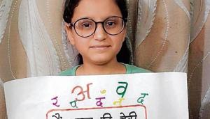 A student of Green Land Convent School, Ludhiana, with her poster.(HT) A student of Green Land Convent School, Ludhiana, with her poster.(HT)