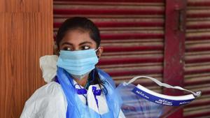 A medic waits for citizens at a Covid-19 test centre, Bangalore, September 17, 2020(PTI) A medic waits for citizens at a Covid-19 test centre, Bangalore, September 17, 2020(PTI)