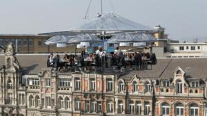 A nine tons structure that can accommodate a total of thirty two guests, suspended from a crane.(REUTERS) A nine tons structure that can accommodate a total of thirty two guests, suspended from a crane.(REUTERS)
