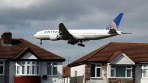 A United Airlines passenger aircraft arrives over the top of residential houses to land at Heathrow Airport in west London, Britain.(Reuters File) A United Airlines passenger aircraft arrives over the top of residential houses to land at Heathrow Airport in west London, Britain.(Reuters File)