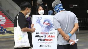 A supporter of Hong Kong protesters holds a placard calling for a boycott of the Disney-produced film "Mulan" in a protest in Seoul, South Korea, Thursday, Sept. 17, 2020. The supporter denounced remarks supporting the Hong Kong police in the Chinese political turmoil by Chinese actress Liu Yifei, a cast member in the film. (Representational)(AP) A supporter of Hong Kong protesters holds a placard calling for a boycott of the Disney-produced film "Mulan" in a protest in Seoul, South Korea, Thursday, Sept. 17, 2020. The supporter denounced remarks supporting the Hong Kong police in the Chinese political turmoil by Chinese actress Liu Yifei, a cast member in the film. (Representational)(AP)