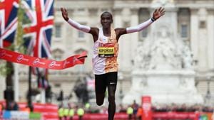 Eliud Kipchoge of Kenya crosses the finish line to win the Men's Elite race breaking the race record during the Virgin Money London Marathon in 2019.(Getty Images) Eliud Kipchoge of Kenya crosses the finish line to win the Men's Elite race breaking the race record during the Virgin Money London Marathon in 2019.(Getty Images)