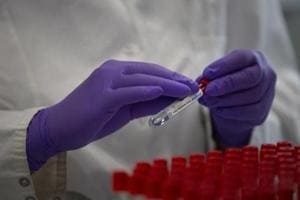 A lab technician puts a label on to a test tube while conducting research on coronavirus disease, Covid-19, at Johnson & Johnson subsidiary Janssen Pharmaceutical in Beerse, Belgium in this file photo.(AP Photo) A lab technician puts a label on to a test tube while conducting research on coronavirus disease, Covid-19, at Johnson & Johnson subsidiary Janssen Pharmaceutical in Beerse, Belgium in this file photo.(AP Photo)