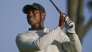 Tiger Woods, of the United States, plays his shot from the fourth tee during the second round of the US Open Golf Championship.(AP) Tiger Woods, of the United States, plays his shot from the fourth tee during the second round of the US Open Golf Championship.(AP)