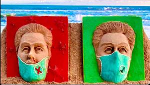 The picture shows two faces with masks on.(Twitter@sudarsansand) The picture shows two faces with masks on.(Twitter@sudarsansand)
