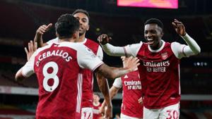 Soccer Football - Premier League - Arsenal v West Ham United - Emirates Stadium, London, Britain - September 19, 2020. Arsenal's Eddie Nketiah celebrates scoring their second goal with teammates. Pool via REUTERS/Will Oliver(Pool via REUTERS) Soccer Football - Premier League - Arsenal v West Ham United - Emirates Stadium, London, Britain - September 19, 2020. Arsenal's Eddie Nketiah celebrates scoring their second goal with teammates. Pool via REUTERS/Will Oliver(Pool via REUTERS)