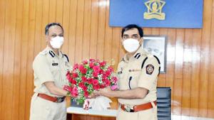 Outgoing Pune top cop congratulates newly appointed Amitabh Gupta at the commissioner’s office in Pune on Sunday.(HT PHOTO) Outgoing Pune top cop congratulates newly appointed Amitabh Gupta at the commissioner’s office in Pune on Sunday.(HT PHOTO)