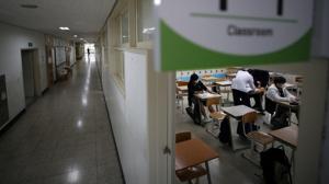 High school students prepare for a class amid the coronavirus disease (Covid-19) pandemic at a high school in Seoul, South Korea.(Reuters) High school students prepare for a class amid the coronavirus disease (Covid-19) pandemic at a high school in Seoul, South Korea.(Reuters)