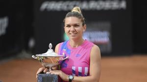 Romania's Simona Halep poses with her trophy after beating Czech Republic's Karolina Pliskova during their final match at the Italian Open tennis tournament, in Rome.(AP) Romania's Simona Halep poses with her trophy after beating Czech Republic's Karolina Pliskova during their final match at the Italian Open tennis tournament, in Rome.(AP)