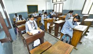 The educational institutions reopened on Monday with students of Classes 9 to 12 coming to school with written consent of parents to seek guidance. While most schools opened without students, at some places a large number of students gathered at the institutions and even classes were held, forcing the authorities to revise the guidelines.(Gurpreet Singh/HT) The educational institutions reopened on Monday with students of Classes 9 to 12 coming to school with written consent of parents to seek guidance. While most schools opened without students, at some places a large number of students gathered at the institutions and even classes were held, forcing the authorities to revise the guidelines.(Gurpreet Singh/HT)